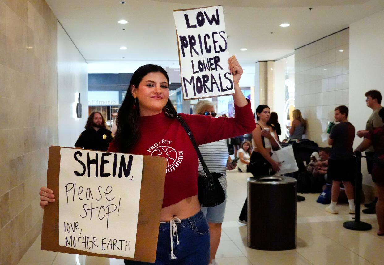 Emma Heines, 22, of Walnut Hills, organized the protest over social media after hearing fast-fashion retailer was coming to Cincinnati.