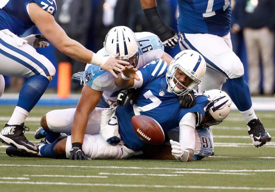 <p>Jacoby Brissett #7 of the Indianapolis Colts fumbles the ball against the Tennessee Titans at Lucas Oil Stadium on November 26, 2017 in Indianapolis, Indiana. (Photo by Andy Lyons/Getty Images) </p>