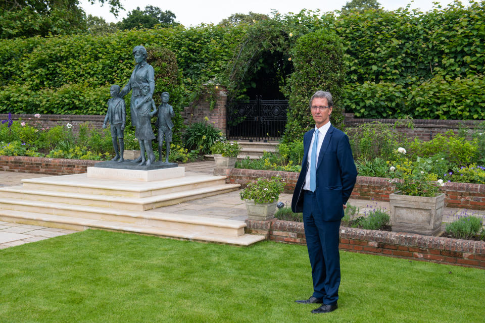 LONDON, ENGLAND - JULY 01: Sculptor, Ian Rank-Broadley poses with his Diana, Princess of Wales statue in the Sunken Garden at Kensington Palace, following the unveiling on July 1, 2021 in London, England. Today would have been the 60th birthday of Princess Diana, who died in 1997. At a ceremony here today, her sons Prince William, Duke of Cambridge and Prince Harry, Duke of Sussex unveiled a statue in her memory. (Photo by Dominic Lipinski - WPA Pool/Getty Images)