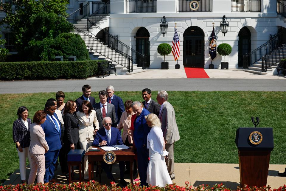 U.S. President Joe Biden signs the CHIPS and Science Act of 2022 during a ceremony on the South Lawn of the White House on August 9, 2022 in Washington, DC. The centerpiece of the legislation is $52 billion in funding aimed at boosting U.S semiconductor chip manufacturing and continued scientific research in the field to better compete with Chinas increasing dominance in the sector. (Photo by Chip Somodevilla/Getty Images) ORG XMIT: 775852639 ORIG FILE ID: 1242402202