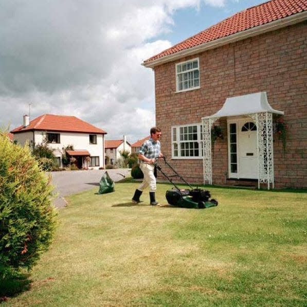 1992: A villager mowing his lawn - Martin Parr/ Magnum Photos