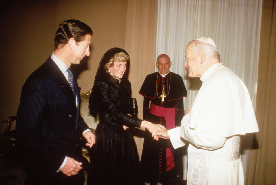 Princess Diana was snapped respecting the traditional Vatican dress code when she met the Pope. Photo: Getty Images