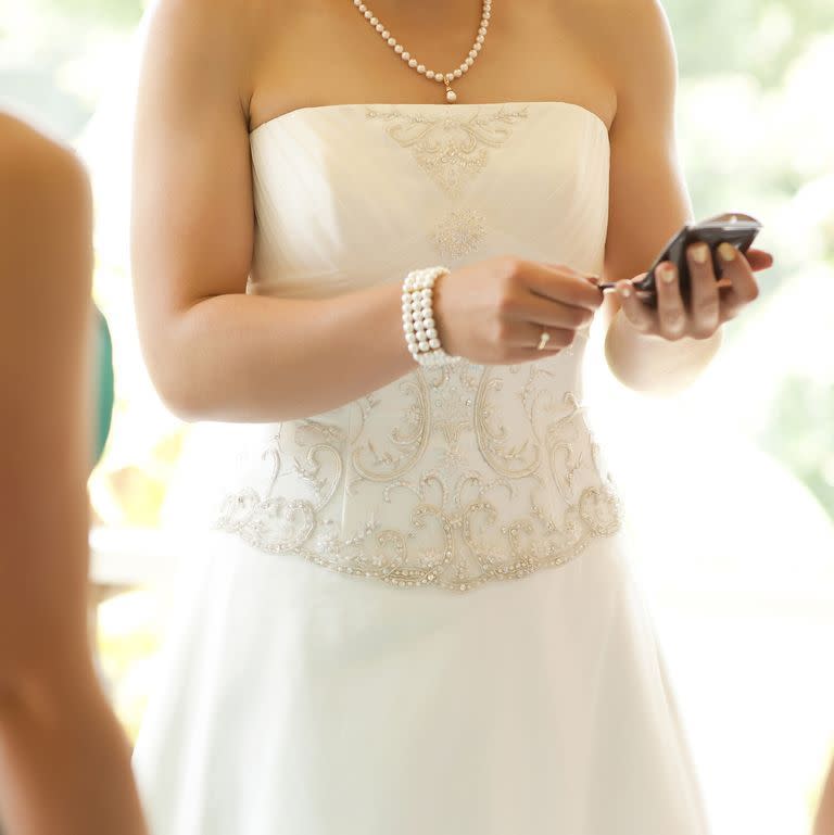 You text the bride on her wedding day.
