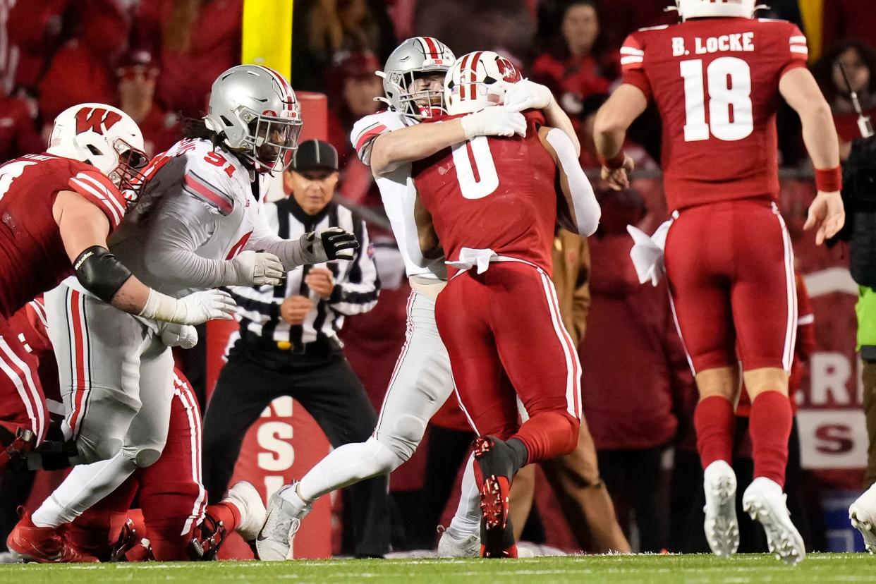 Ohio State linebacker Tommy Eichenberg stands up Wisconsin running back Braelon Allen (0) at the goal line on Saturday.