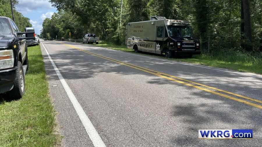 View of Bellingrath Road in Mobile, County, Alabama, with a Mobile County Flotilla Dive Truck, along with the WKRG.com logo