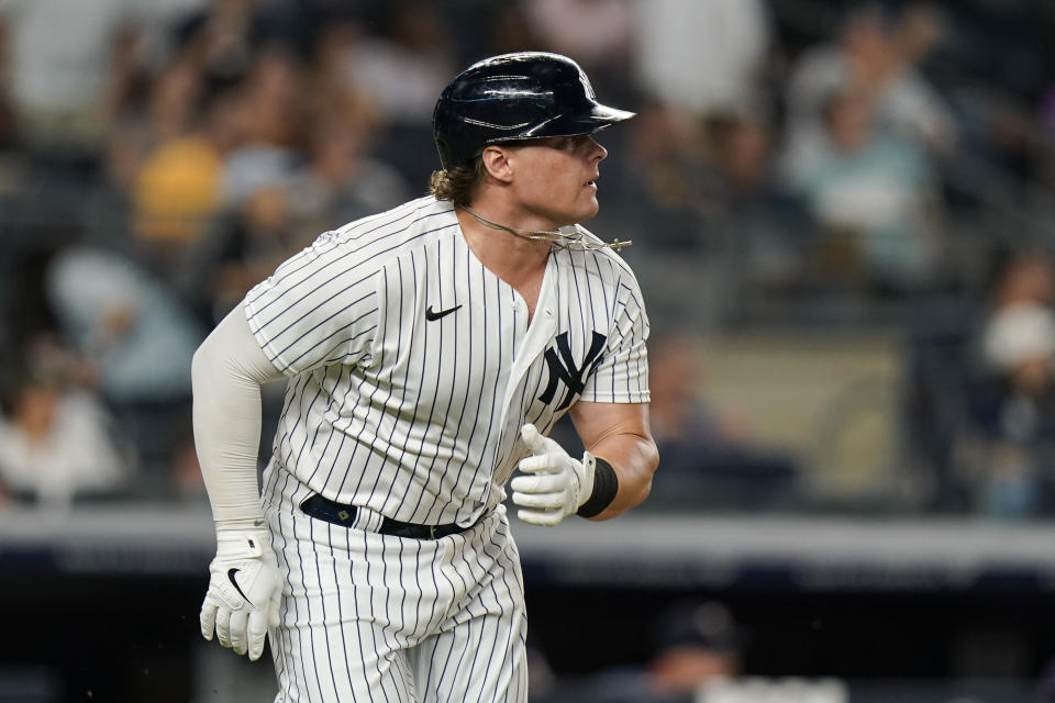 New York Yankees' Luke Voit watches a ball he hit for a ground rule double to drive in a run during the fourth inning of a baseball game against the Minnesota Twins, Friday, Aug. 20, 2021, in New York. (AP Photo/Frank Franklin II)