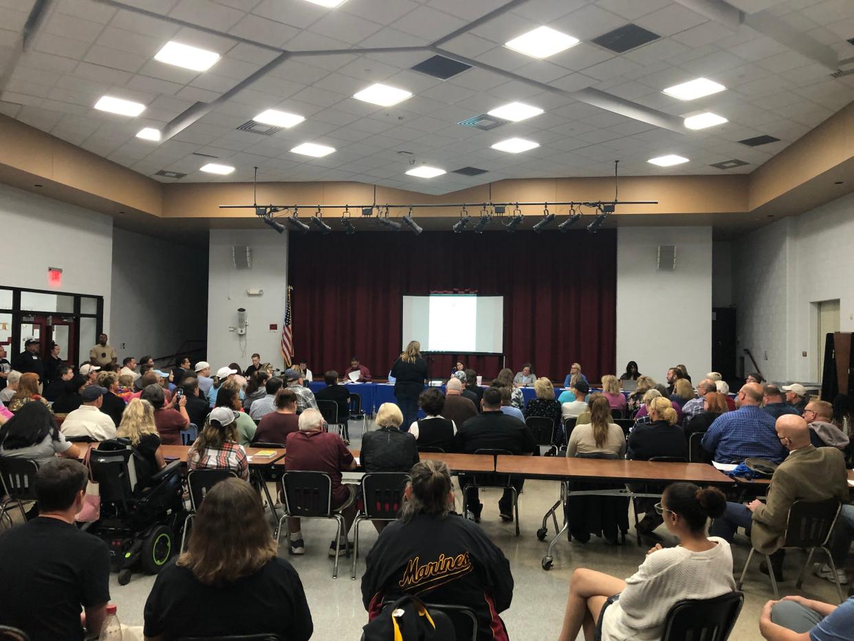 People attend a Western Heights school board meeting Monday night.