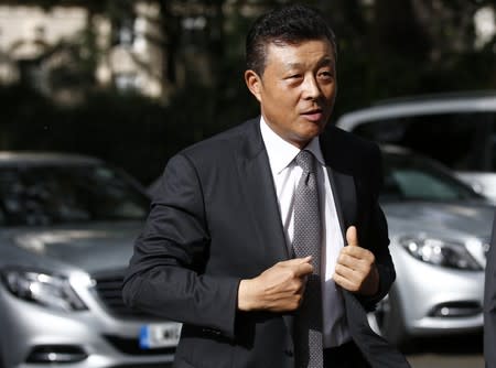 China's ambassador to Britain Liu Xiaoming arrives at 10 Carlton House Terrace in central London, where representatives from Britain, China, France and energy company EDF will sign an agreement to build a new nuclear power station at Hinkley Point