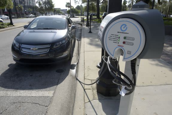 A Chevy Volt gas-electric hybrid recharges its battery in Ocala, Florida, Aug. 5, 2015.