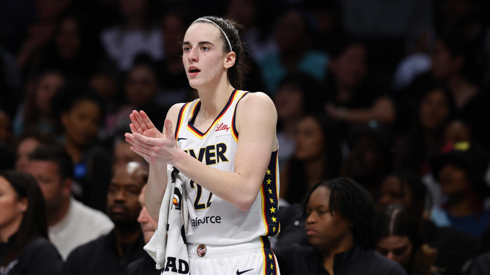 Indiana Fever guard Caitlin Clark reacts after her team scored against the New York Liberty during second half of a WNBA basketball game, Saturday, May 18, 2024, in New York. The Liberty won 91-80. (AP Photo/Noah K. Murray)