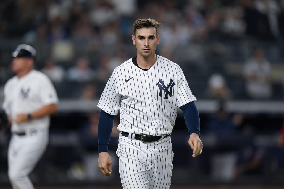 New York Yankees' Tim Locastro reacts after striking out during the sixth inning of a baseball game against the Boston Red Sox, Friday, July 16, 2021, in New York. (AP Photo/Frank Franklin II)