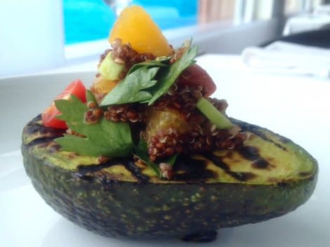 The grilled avocado with quinoa salad is perfect either as a vegetarian side or as a healthy meal on its own.