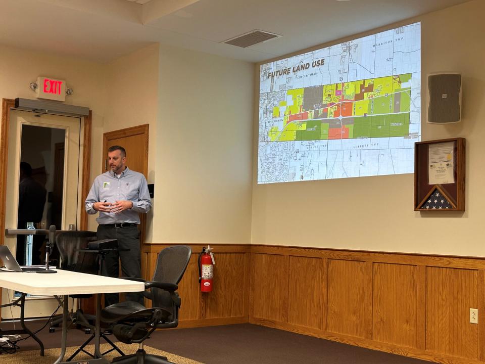 Jim Lenner, president and CEO of Neighborhood Strategies, presents a draft of Etna Township's comprehensive plan to the township's zoning commission on Jan. 23.
