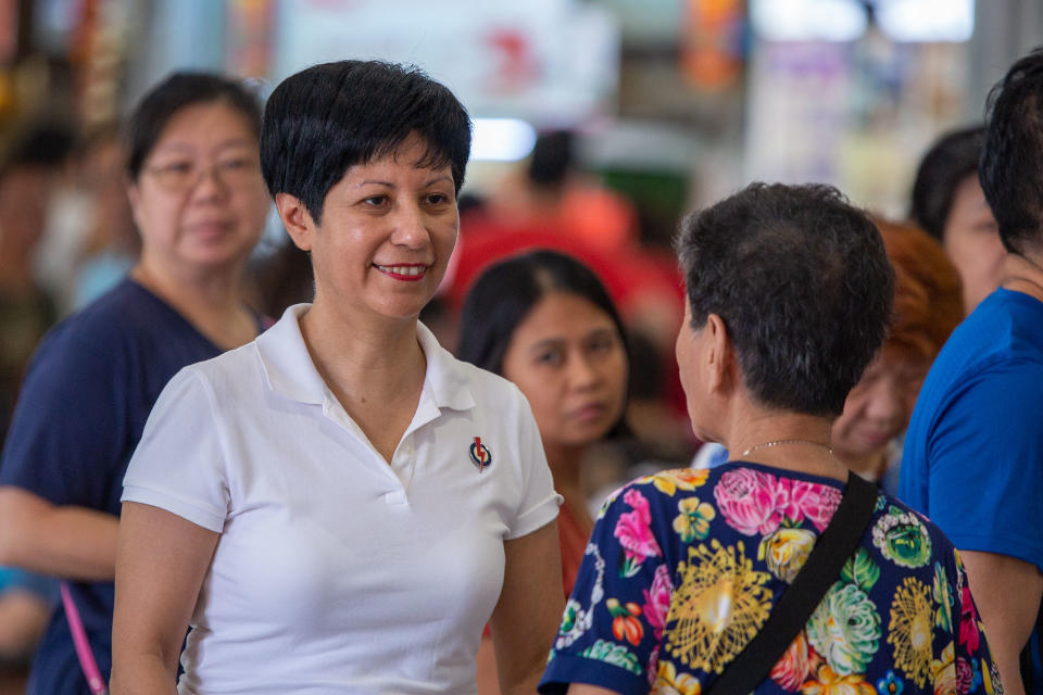 Tanjong Pagar GRC MP Indranee Rajah speaking to a patron at the Tiong Bahru Food Centre on Sunday (29 September). (PHOTO: Dhany Osman / Yahoo News Singapore)