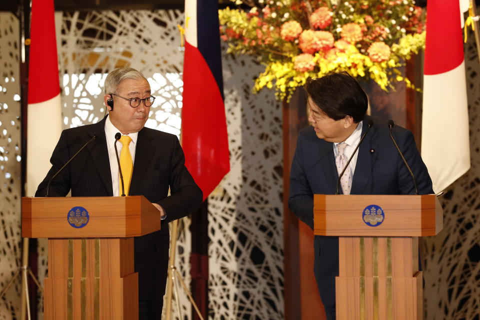 Philippine Foreign Secretary Teodoro Locsin Jr., left, and Japanese Foreign Minister Yoshimasa Hayashi, speak during a news conference in Tokyo, Japan, Saturday, April 9, 2022. Locsin and Defense Secretary Delfin Lorenzana are visiting Japan to meet with their counterparts. (Rodrigo Reyes Marin/Pool Photo via AP)