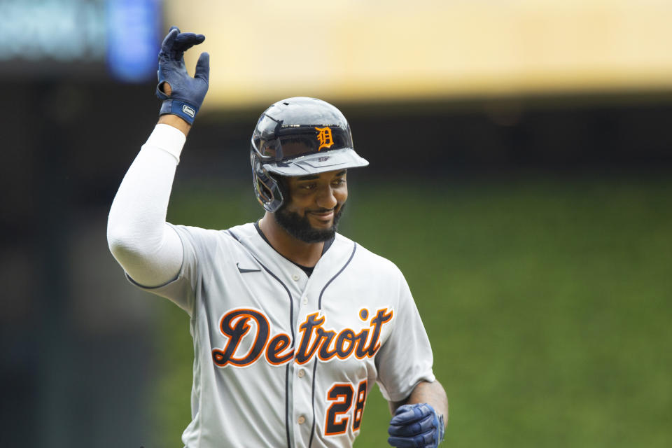 Detroit Tigers third baseman Niko Goodrum (28) reacts to the crowd after hitting a home run against the Minnesota Twins in the first inning of a baseball game, Saturday, July 10, 2021, in Minneapolis. (AP Photo/Andy Clayton-King)