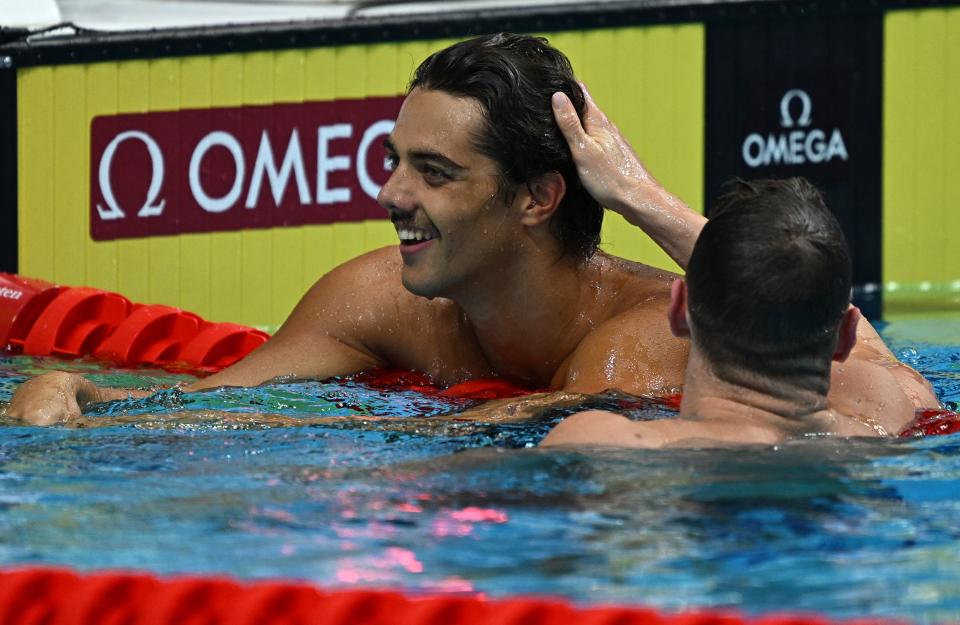 Thomas Ceccon, pictured here after breaking the world record in the men's 100m backstroke.