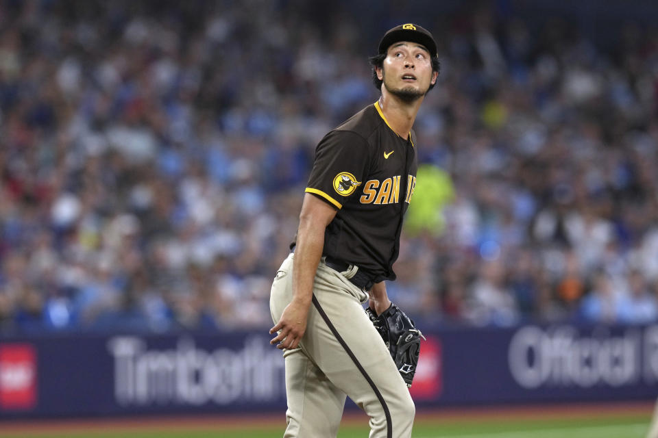 San Diego Padres starting pitcher Yu Darvish watches the flight of the ball during the sixth inning of a baseball game against the Toronto Blue Jays on Wednesday, July 19, 2023, in Toronto. (Chris Young/The Canadian Press via AP)