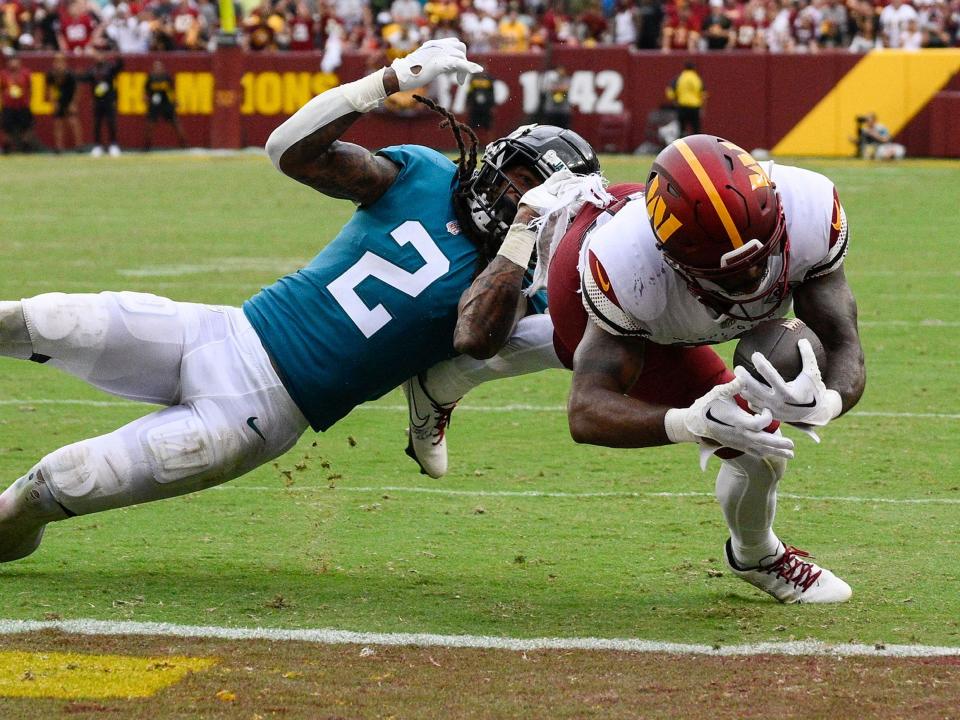 J.D. McKissic dives for the end zone against the Jacksonville Jaguars.