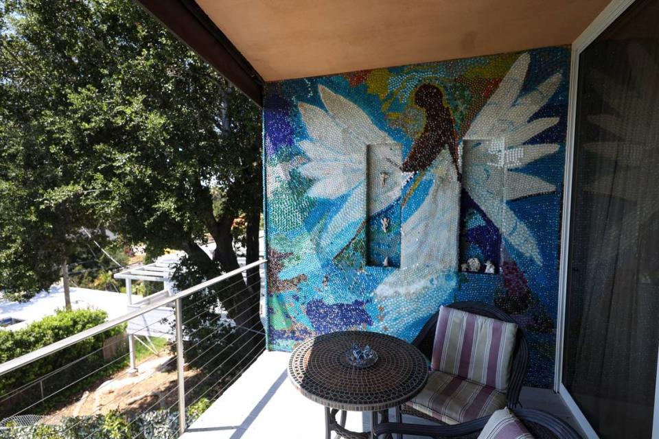 A mosaic of an angel fills the wall on a balcony in the San Luis Obispo home owned by Bruce and Suki Mason, seen here on May 10, 2024.
