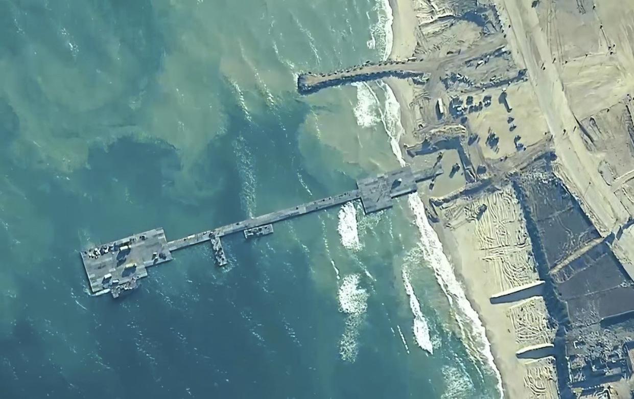 An aerial view of the floating pier off Gaza shows its basic structure. <a href="https://newsroom.ap.org/detail/UnitedStatesGazaAid/475b1e85eed9410abddc2aa162533f22/photo" rel="nofollow noopener" target="_blank" data-ylk="slk:U.S. Central Command via AP;elm:context_link;itc:0;sec:content-canvas" class="link ">U.S. Central Command via AP</a>