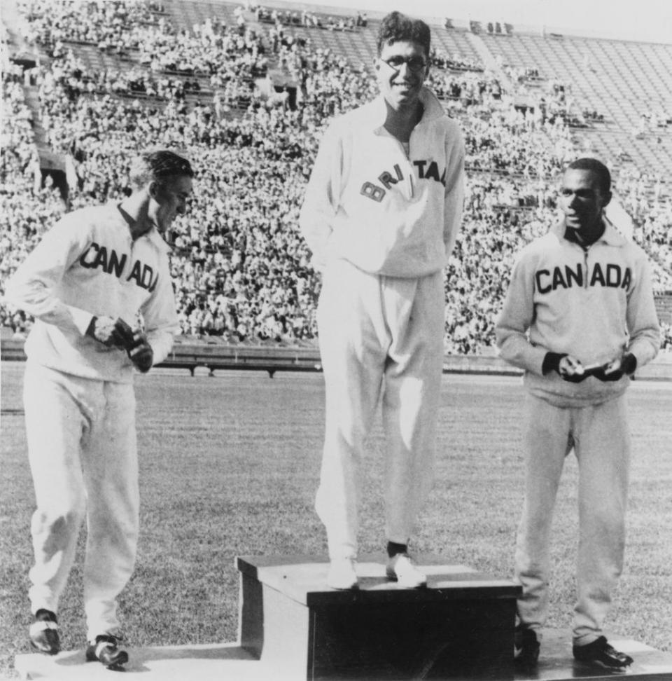 British athlete Tommy Hampson (1907-1965), and Canadian athlete Phil Edwards (1907-1971) on the podium after the final of the Men's 800 Metres event at the 1932 Summer Olympics, at the Los Angeles Memorial Coliseum, Los Angeles,