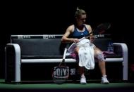 Tennis - Singapore WTA Finals Round Robin Singles - Singapore Indoor Stadium, Singapore - 27/10/2016 - Simona Halep of Romania sits on her bench during her match against Dominika Cibulkova of Slovakia REUTERS/Edgar Su