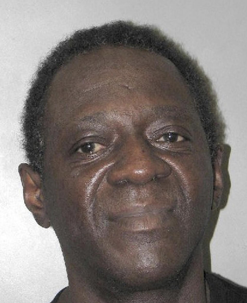 This Henderson Detention Center booking photo shows entertainer Flavor Flav following his arrest Oct. 4, 2021, in Henderson, Nev. Police and court documents said Tuesday, Oct. 19 the 62-year-old former hip-hop and reality TV star, whose legal name is William Jonathan Drayton Jr., faces a misdemeanor domestic battery charge stemming from a scuffle with his girlfriend at home. Drayton's lawyers say they'll explain his side of the story in court. (Henderson Police Department via AP)