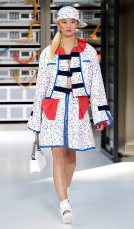 A model presents a creation by German designer Karl Lagerfeld as part of his Spring/Summer 2017 women's ready-to-wear collection for fashion house Chanel. REUTERS/Charles Platiau