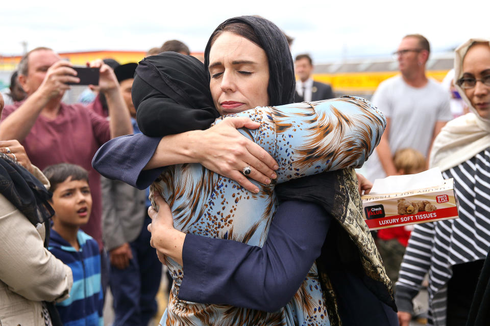 The mural was modelled off this image of Jacinda Ardern hugging a Muslim woman. Source: Getty