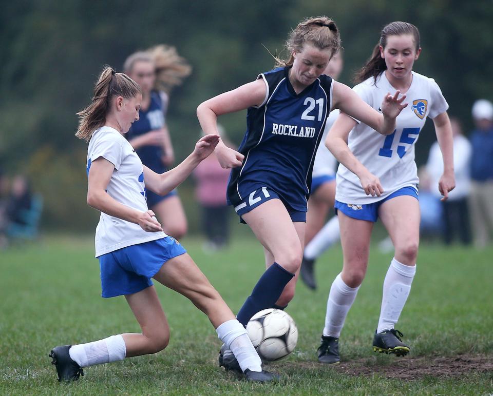 Hull’s Elsie Harper clears the ball off the foot of Rockland's Maddison Hermenau who was threatening during second half action of their game at the Reed Street Field on Friday, Sept. 17, 2021.