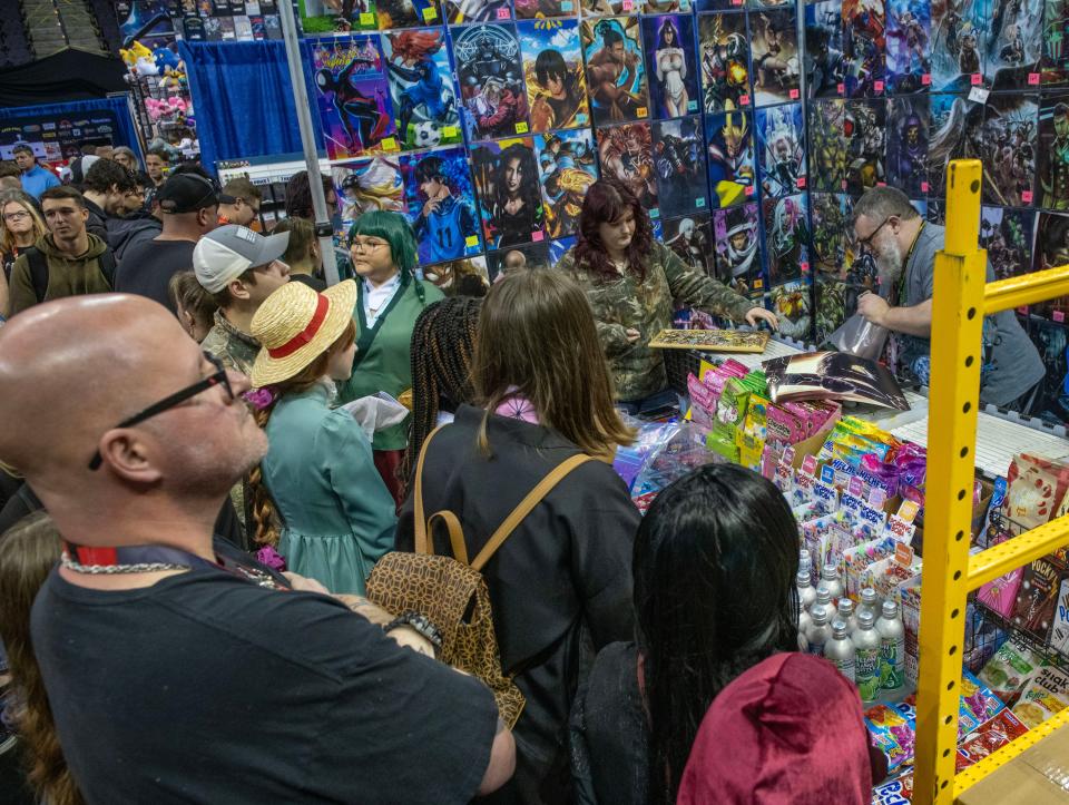 Comic, Sci-Fi and Cosplay fans check out the festivities during the 11th annual Pensacon at the Pensacola Bay Center Saturday, Feb. 24, 2024. Pensacon draws thousands of people each year and the Pensacola Bay Center, despite its age and need for upgrades, is the best venue option for the event due to the center's size and location.