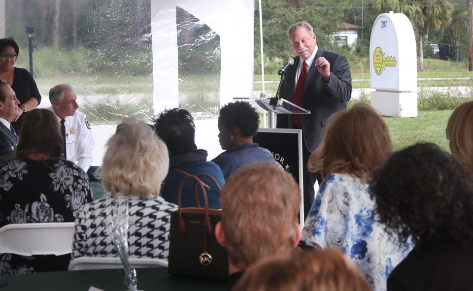 State Attorney RJ Larizza speaks to the crowd of officials and partners gathered Thursday Nov. 17, 2022, for the ribbon-cutting at the Volusia Family Resource Center.