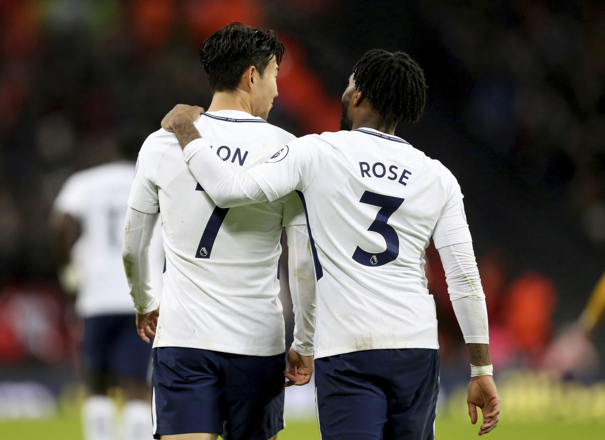 Tottenham Hotspur’s Son Heung-Min celebrates scoring his side’s second goal of the game with team mate Danny Rose, right, during the game against Brighton & Hove Albion during their English Premier League soccer match at Wembley Stadium in London, Wednesday Dec. 13, 2017. (Nigel French/PA via AP)