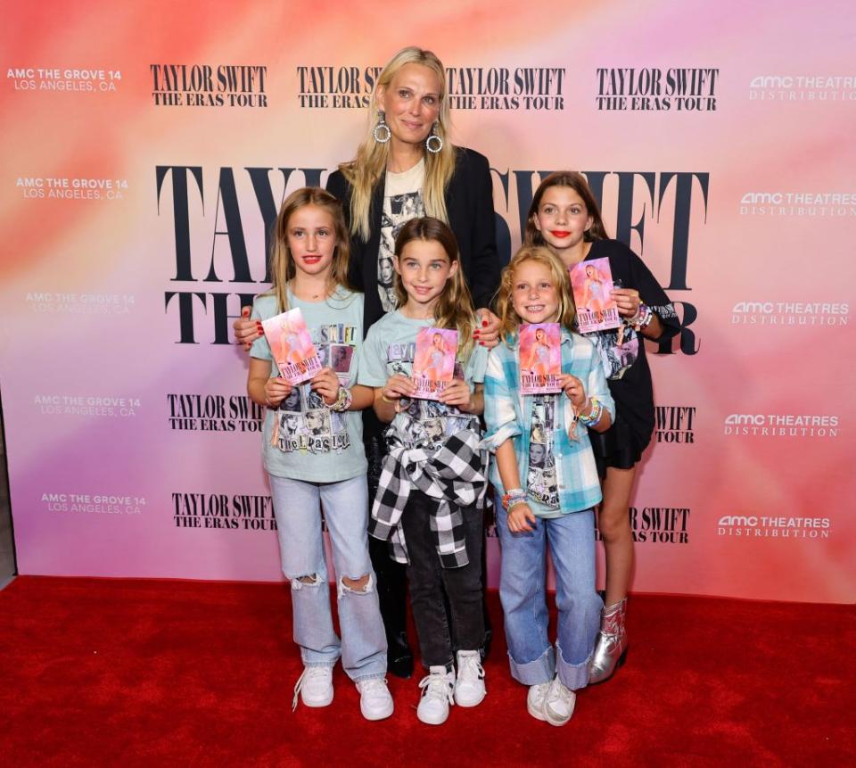 LOS ANGELES, CALIFORNIA - OCTOBER 11: Molly Sims (C) and guests attend "Taylor Swift: The Eras Tour" Concert Movie World Premiere at AMC The Grove 14 on October 11, 2023 in Los Angeles, California. (Photo by Matt Winkelmeyer/Getty Images)