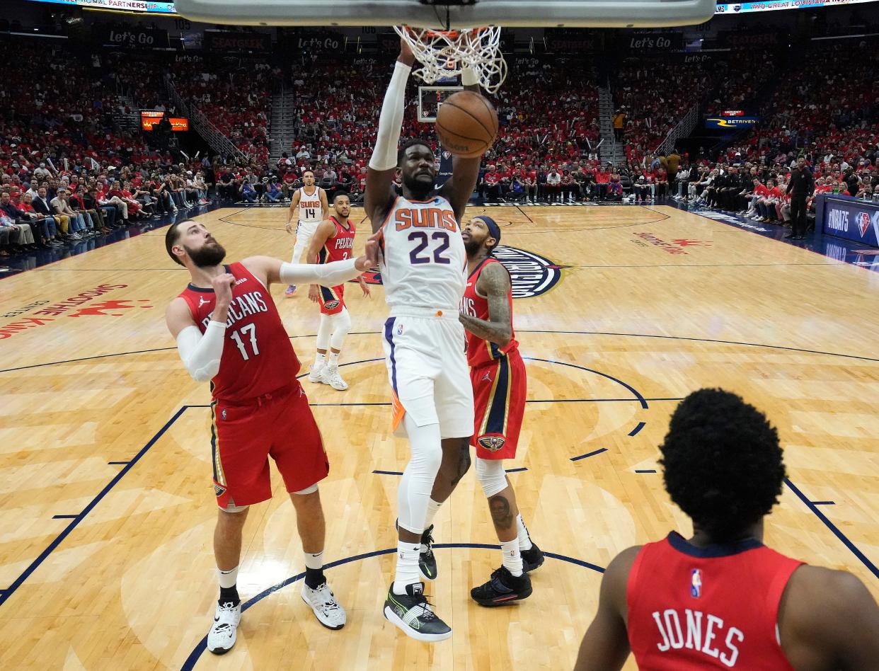 Apr 22, 2022; New Orleans, Louisiana, U.S.;  Phoenix Suns center Deandre Ayton (22) slams two against the New Orleans Pelicans during Game 3 of the Western Conference playoffs.