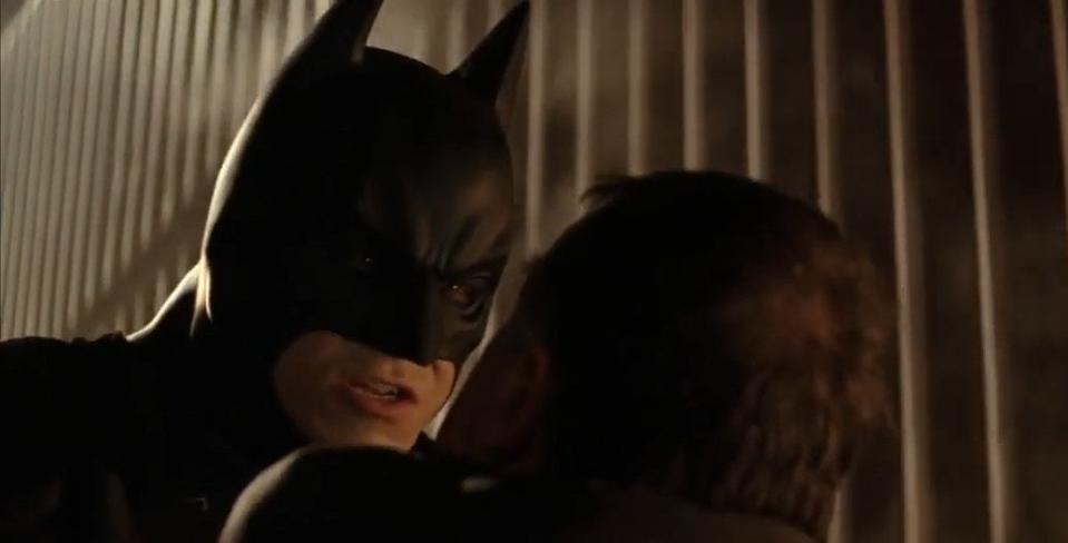 Batman holding Carmine Falcone in "Batman Begins"