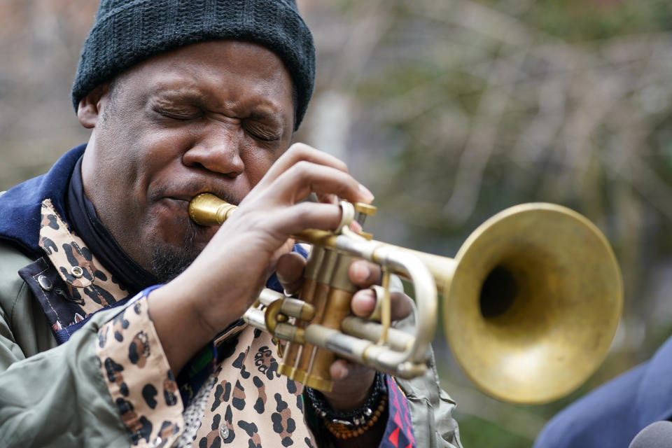 Keyon Harrold Sr. play his saxophone during a news conference to announce the filing of a lawsuit against Arlo Hotels and Miya Ponsetto, Wednesday, March 24, 2021, in New York. Keyon Harrold and his son were allegedly racially profiled in an Arlo hotel in Manhattan by Miya Ponsetto in December 2020. Ponsetto wrongly accused Keyon Harrold Jr. of stealing her phone and physically attacking him. (AP Photo/Mary Altaffer)