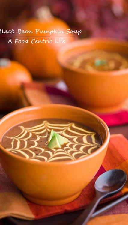 <p>Pipe a spider web design on top to bring the spooks.</p><p>Get the recipe from <a href="http://afoodcentriclife.com/black-bean-and-pumpkin-soup/" rel="nofollow noopener" target="_blank" data-ylk="slk:A Food Centric Life;elm:context_link;itc:0;sec:content-canvas" class="link ">A Food Centric Life</a>.</p>