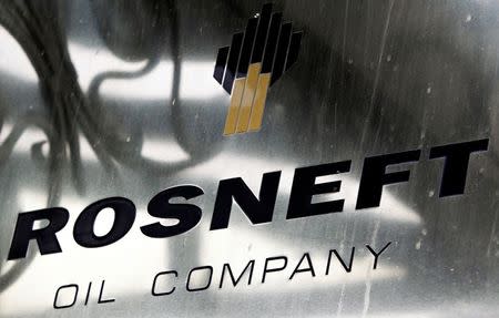 FILE PHOTO: A logo of Russian state oil firm Rosneft is seen at its office in Moscow, October 18, 2012. REUTERS/Maxim Shemetov/File Photo