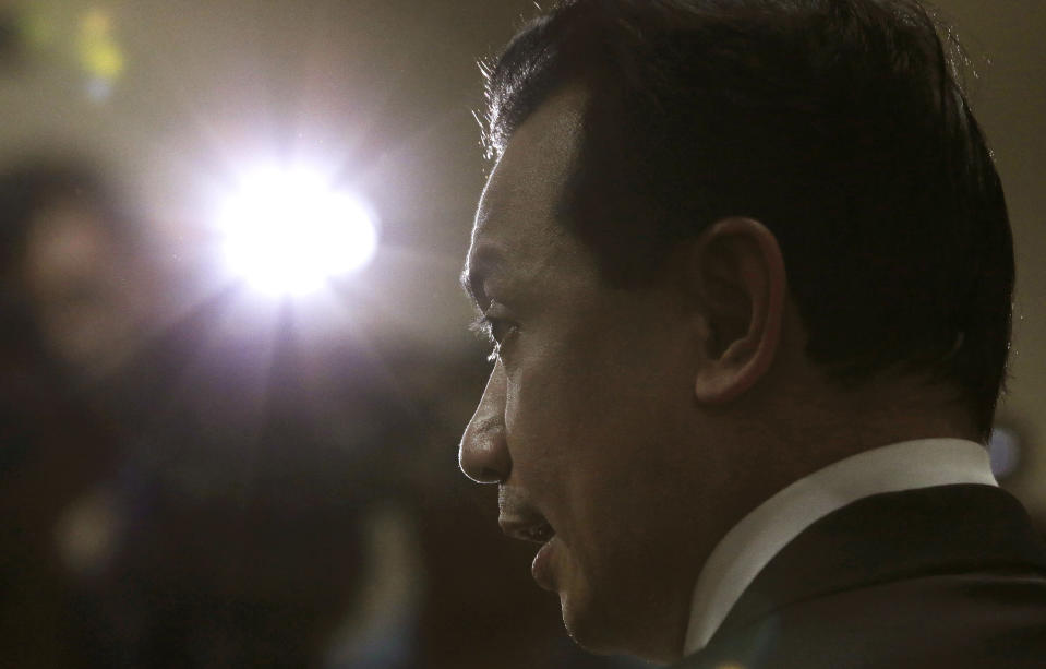 Philippine opposition Sen. Antonio Trillanes IV talks to reporters outside his office where he remains holed up in the Philippine Senate in suburban Pasay city, south of Manila, Philippines on Tuesday, Sept. 11, 2018. Trillanes has been staying inside his senate office for over a week to avoid an arrest order by Philippine President Rodrigo Duterte. (AP Photo/Aaron Favila)