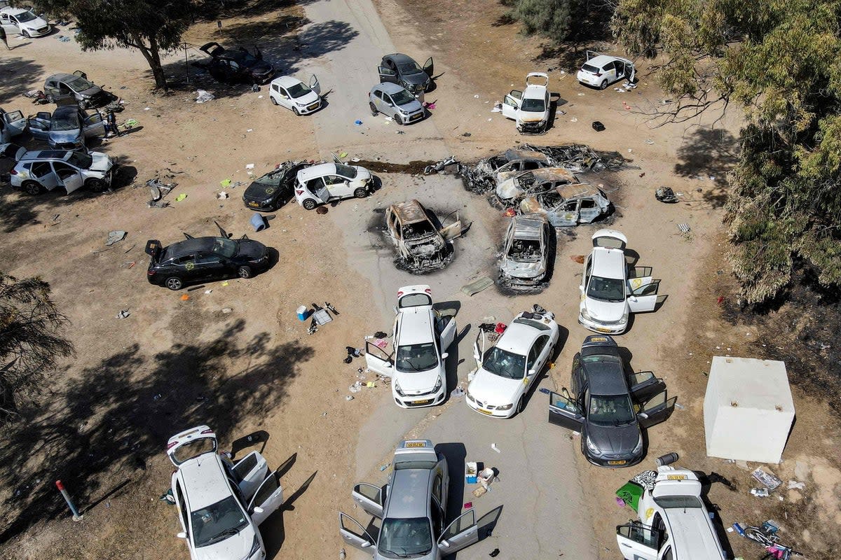 Aerial photo of abandoned and torched vehicles at the site of the October 7 attack on the Supernova desert music festival (AFP via Getty Images)