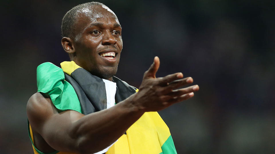 Pictured here, Usain Bolt gestures towards a supporter after a race. Pic: Getty