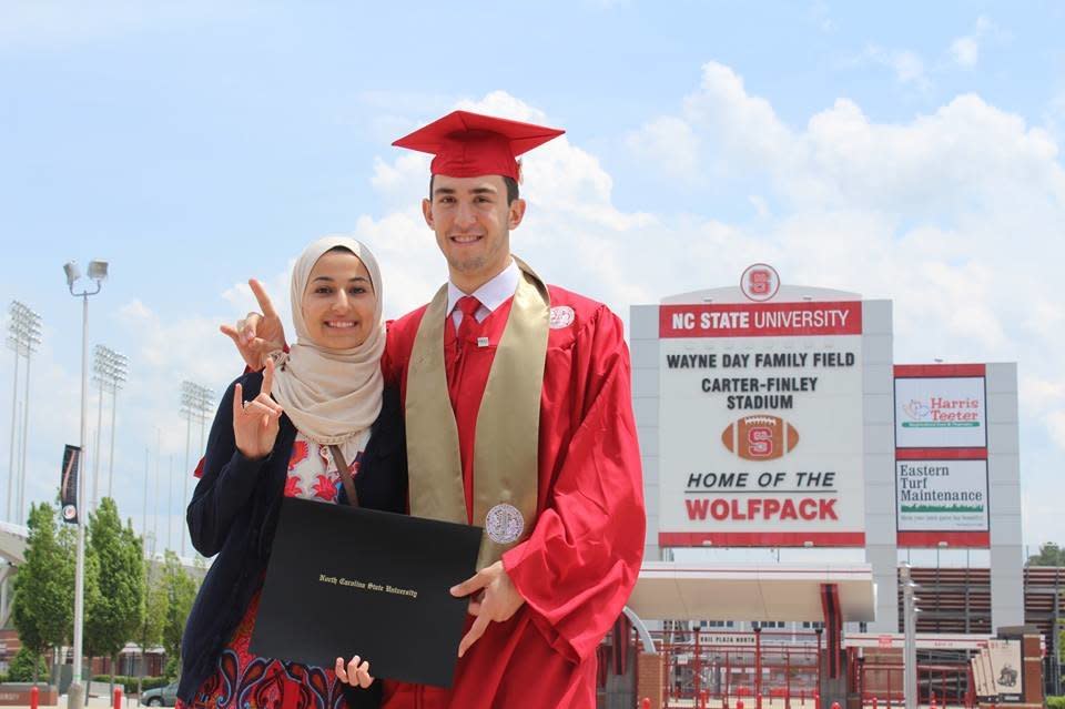 Yusor Abu-Salha, right, and her husband Deah Shaddy Barakat. Yusor's Facebook post reads, "Pack Nation."