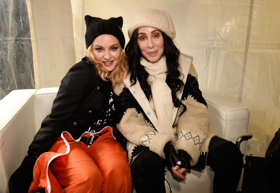 Madonna and Cher sit together during the Women's March on Washington on Jan. 21, 2017. (Photo: Kevin Mazur via Getty Images)