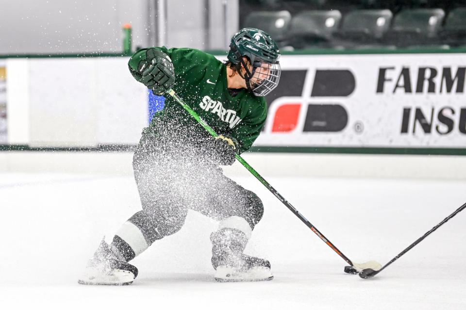 Michigan State's Red Savage moves the puck in practice during hockey media day on Wednesday, Sept. 27, 2023, at Munn Arena in East Lansing.