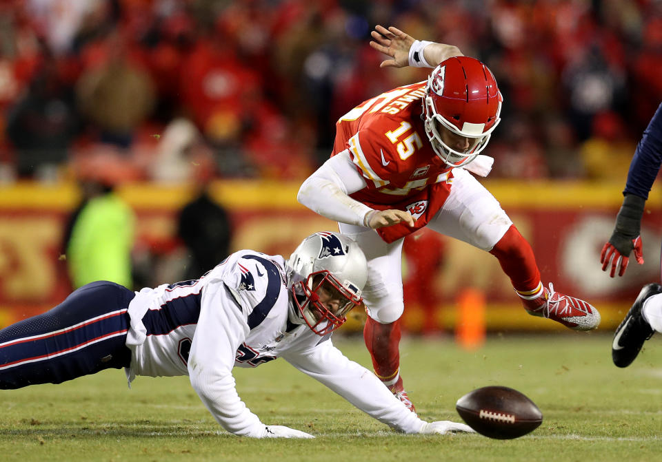 <p>Patrick Mahomes #15 of the Kansas City Chiefs fumbles the ball as he is hit by Kyle Van Noy #53 of the New England Patriots in the second quarter during the AFC Championship Game at Arrowhead Stadium on January 20, 2019 in Kansas City, Missouri. (Photo by Patrick Smith/Getty Images) </p>