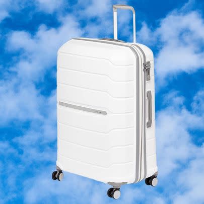An expandable Samsonite checked suitcase