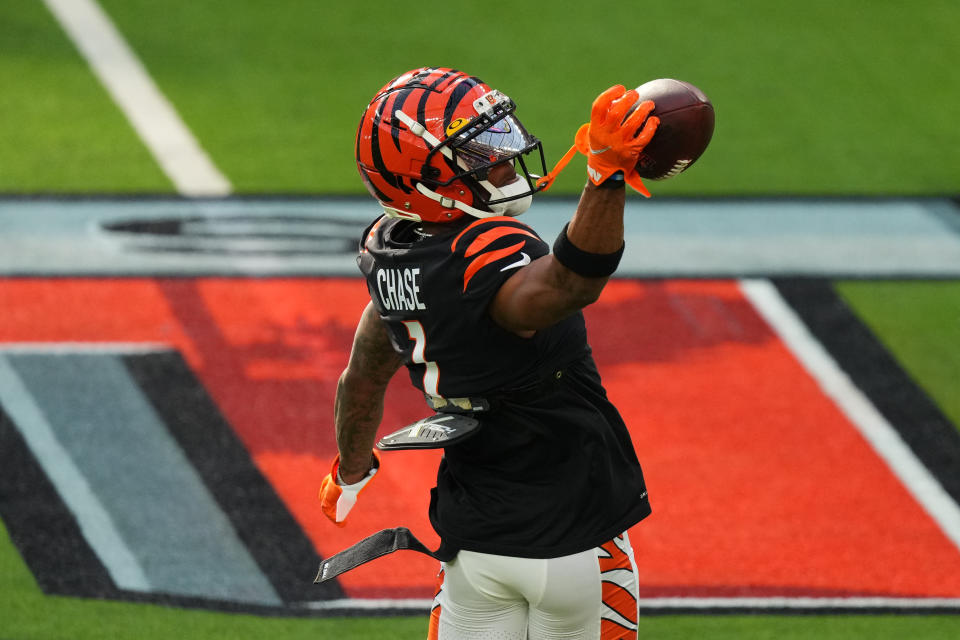 INGLEWOOD, CALIFORNIA - FEBRUARY 13: JaMarr Chase #1 of the Cincinnati Bengals warms up prior to the NFL Super Bowl LVI football game against the Los Angeles Rams at SoFi Stadium on February 13, 2022 in Inglewood, California. (Photo by Cooper Neill/Getty Images)