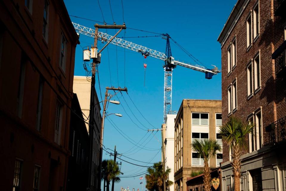 A crane near some of the oldest businesses in Charleston, South Carolina on Sunday, August 29, 2021.